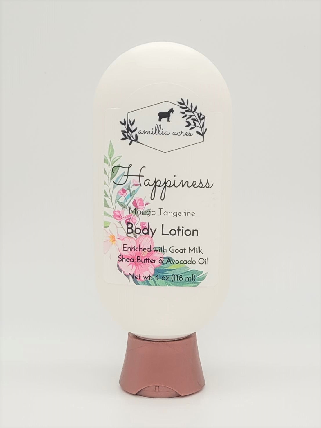 A 4 oz (118 ml) bottle of "Happiness" Goat Milk Lotion by Amillia Acres ~ Goat Milk Soaps and Lotions. It has a mango tangerine scent enriched with shea butter and avocado oil, in a white container with floral graphics.
