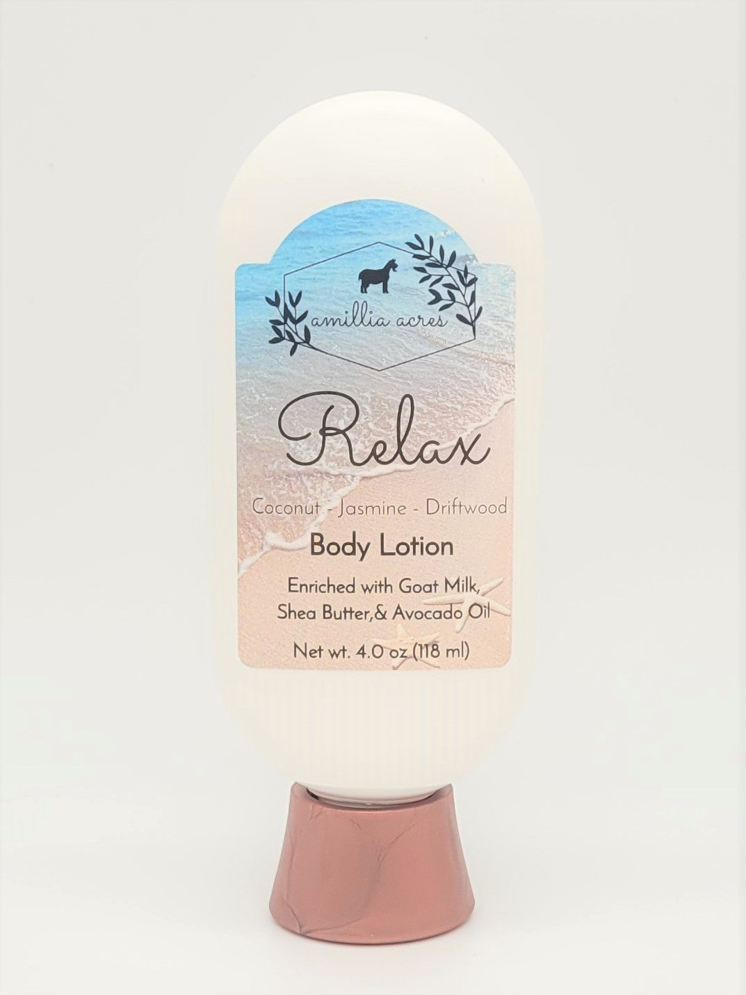 A 4.0 oz bottle of "Relax" Goat Milk Lotion by Amillia Acres blends luxury with handmade skincare, featuring coconut, jasmine, and driftwood scents. The white label with blue and beige design highlights its enriching blend of goat milk, shea butter, and avocado oil.