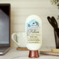 A bottle of Relax Goat Milk Lotion by Amillia Acres ~ Goat Milk Soaps and Lotions sits on a desk near a laptop, cup, notebook, and pens. Its label features coconut, jasmine, and driftwood scents for a luxurious moisturizing experience.