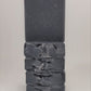Five dark gray Balance goat milk soap bars by Amillia Acres are stacked on a plain light background. The top bar stands upright, highlighting its rough edges, while the others lie flat below it.