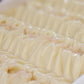 The texture of this dish closely resembles Amillia Acres' Simplicity Goat Milk Soap, capturing artisanal detail and a nourishing essence that promises moisturizing properties like luxurious handmade soap.