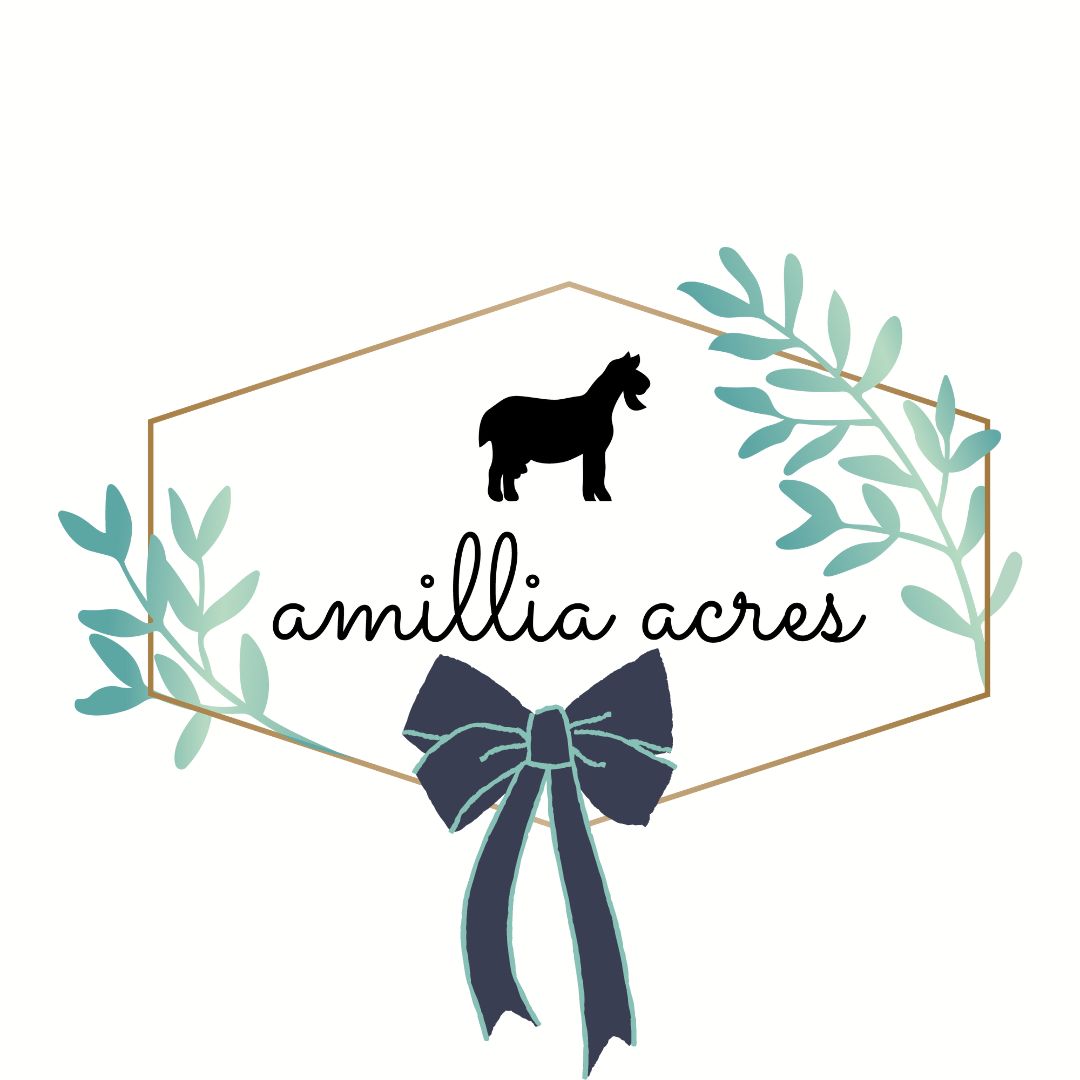 The "Amillia Acres ~ Goat Milk Soaps and Lotions" gift card features a decorative logo with "Amillia Acres" elegantly written in cursive, accompanied by a donkey silhouette above. The design is framed within a geometric shape embellished with green leafy branches and a large dark bow at the bottom, making it an ideal choice for a gift card offering no processing fees.